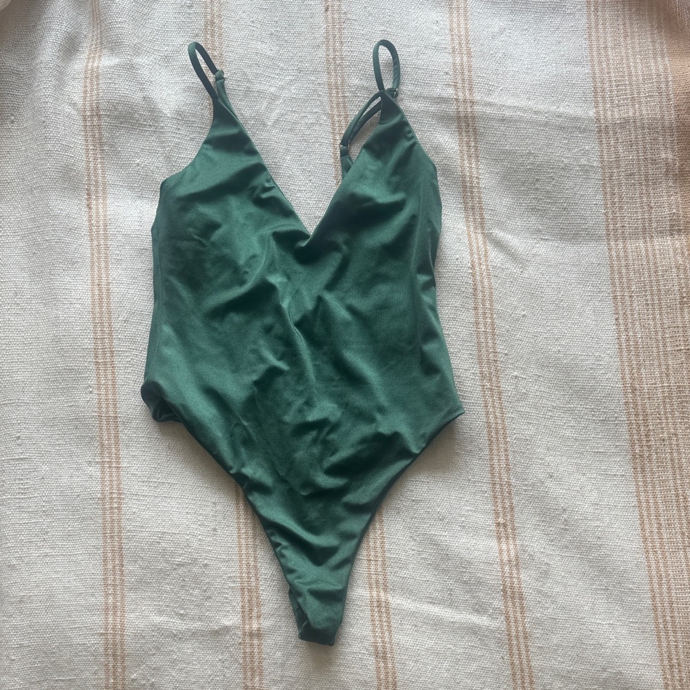 Never been worn retro metallic emerald green V-Neck thong one piece